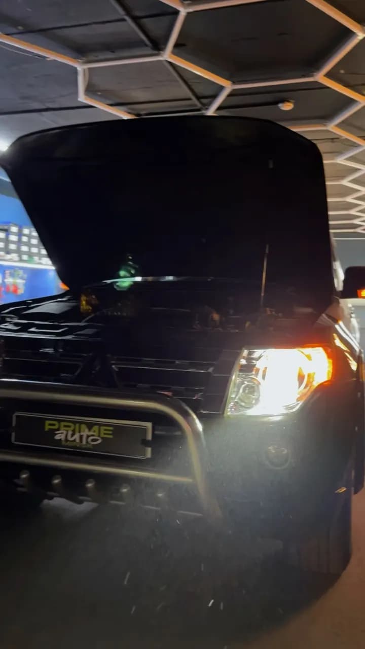 Mitsubishi Pajero: установили bi-led модули, отполировали и оклеили фары плёнкой